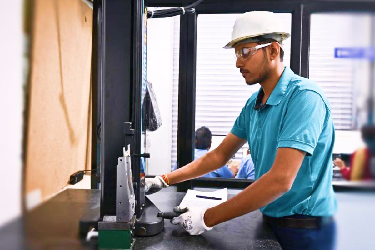 Inspector measuring a component