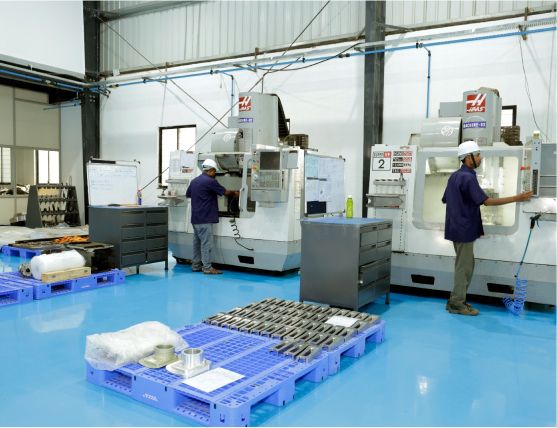 Row of CNC machining centres on the shop floor